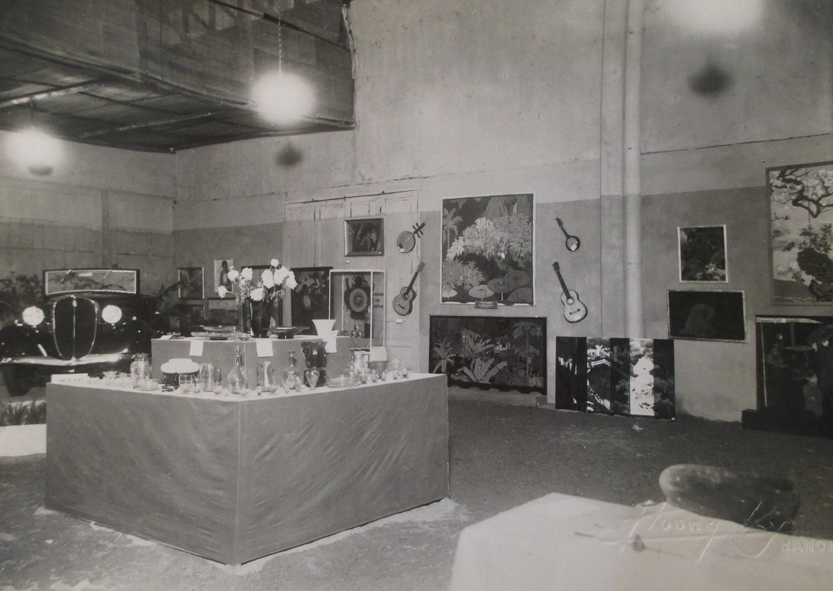 A salon exhibition in Hanoi, showing lacquer paintings by graduates of the EBAI alongside musical instruments and glasswares, 1936. Image courtesy of Institut national d'histoire de l'art, Paris, fonds Victor Tardieu (archives 125, 9).