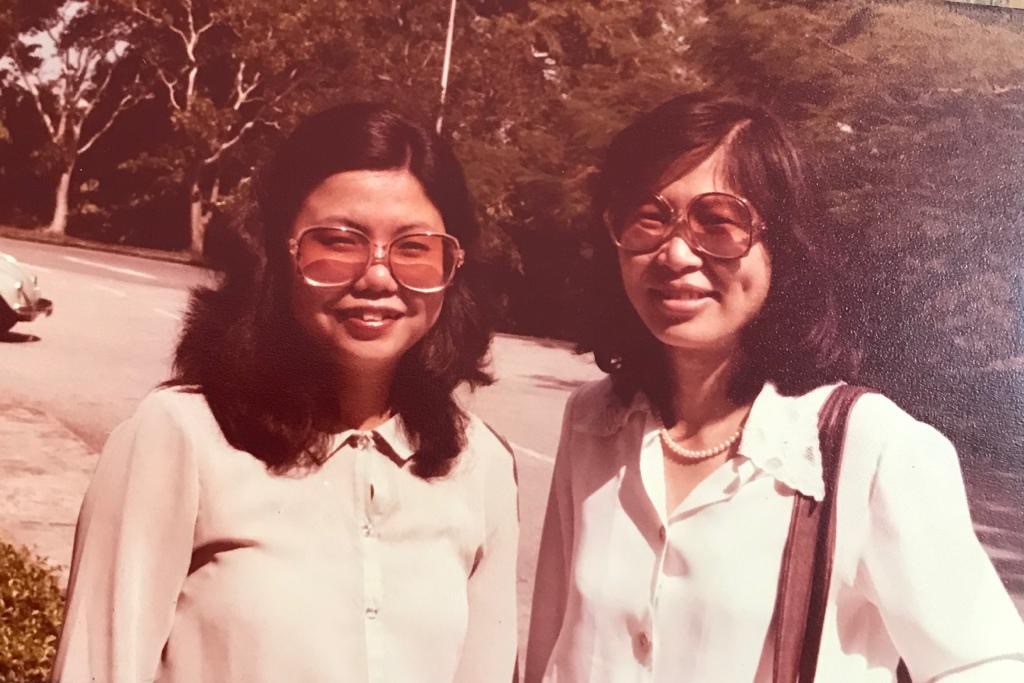 Mabel (left) with her colleague Mee Lian from Ministry of Culture, 1981